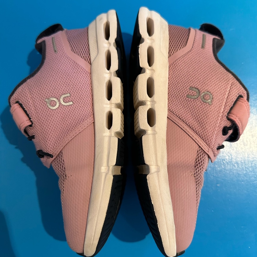 On Running Pink and White Athletic Shoes